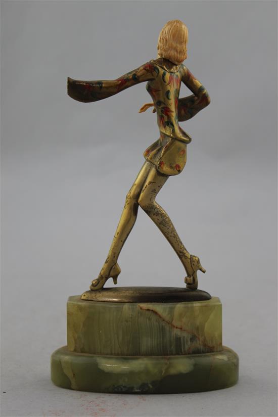 Attributed to Josef Lorenzl. An Art Deco cold painted bronze and ivory figure of a dancer, 8in.